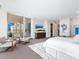 Main bedroom with city views and sitting area at 540 N Tamiami Trl # 1201, Sarasota, FL 34236