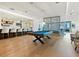 Game room with a pool table, bar, and seating area at 540 N Tamiami Trl # 1201, Sarasota, FL 34236