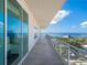 Expansive balcony with panoramic water views at 540 N Tamiami Trl # 1201, Sarasota, FL 34236