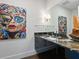 Elegant bathroom with dark vanity and granite countertop at 540 N Tamiami Trl # 1201, Sarasota, FL 34236