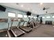 Well-equipped community gym featuring treadmills, ellipticals, and weight machines at 7746 108Th Avenue E Cir, Parrish, FL 34219