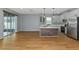 Open concept kitchen with island and gray cabinets at 7746 108Th Avenue E Cir, Parrish, FL 34219