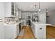 Modern kitchen with stainless steel appliances and white quartz countertops at 7746 108Th Avenue E Cir, Parrish, FL 34219