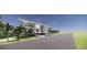 Contemporary home with a driveway and landscaping at 0 Casey Key Rd, Nokomis, FL 34275