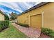 Brick pathway alongside the house leading to the garage at 10655 Glencorse Ter, Bradenton, FL 34211