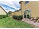 Private patio with brick pavers and seating area, perfect for outdoor relaxation at 10655 Glencorse Ter, Bradenton, FL 34211