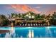 Relaxing resort-style pool with plenty of lounge chairs at 12413 Parigi Way, Sarasota, FL 34238