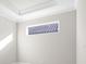 Bright bedroom with large window and neutral walls at 12413 Parigi Way, Sarasota, FL 34238