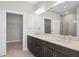 Modern bathroom with double vanity and walk-in shower at 12413 Parigi Way, Sarasota, FL 34238