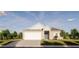 New construction home with beige siding and a two-car garage at 13020 Cedar Elm Lane, Parrish, FL 34219