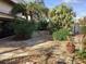 Expansive flagstone patio with tropical landscaping at 1348 Harbor Dr, Sarasota, FL 34239