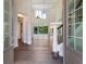 Bright and spacious entryway with high ceilings and hardwood floors at 1637 Hyde Park St, Sarasota, FL 34239