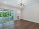 Bright living room with sliding glass doors to backyard at 1637 Hyde Park St, Sarasota, FL 34239