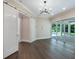Spacious living area with sliding doors to pool and patio at 1637 Hyde Park St, Sarasota, FL 34239