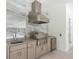 Stainless steel appliances and modern cabinetry highlight this outdoor kitchen at 1637 Hyde Park St, Sarasota, FL 34239