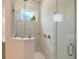 Large walk-in shower with glass enclosure and neutral tile, offering a spa-like experience at 1637 Hyde Park St, Sarasota, FL 34239