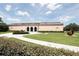 Exterior of a light pink museum with manicured lawns and modern sculptures at 1990 Main St # 15, Sarasota, FL 34236