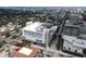 Aerial view of a modern building in a city setting with streets and other buildings visible at 1990 Main St # 15, Sarasota, FL 34236
