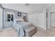 Bedroom with king-size bed and built-in closet at 1990 Main St # 15, Sarasota, FL 34236