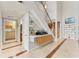 Modern wet bar with a sleek design and built-in cabinetry at 1990 Main St # 15, Sarasota, FL 34236