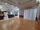 Bright dining room with hardwood floors and oval wooden table at 201 Bayside Ct, Nokomis, FL 34275