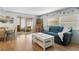 Spacious living room with comfortable seating and view to sunroom at 2107 Palma Sola Blvd # 94, Bradenton, FL 34209