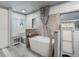 Spa-like bathroom with a freestanding tub and walk-in shower at 2107 Palma Sola Blvd # 94, Bradenton, FL 34209