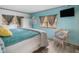 Bright bedroom with a comfortable bed and calming decor at 2107 Palma Sola Blvd # 94, Bradenton, FL 34209
