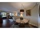 Dining area with view into the living room at 315 30Th W Ave # B311, Bradenton, FL 34205