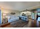 Spacious living area with hardwood floors and kitchen island at 315 30Th W Ave # B311, Bradenton, FL 34205