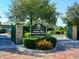 Entrance to Palma Sola Botanical Park with brick pavement and lush landscaping at 315 30Th W Ave # B311, Bradenton, FL 34205