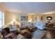 Bright and airy living room with comfy sofas and a large TV at 315 30Th W Ave # B311, Bradenton, FL 34205