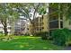 Condo building exterior showcasing a unit with a private balcony at 315 30Th W Ave # B311, Bradenton, FL 34205