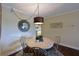 Charming dining area with round table and four chairs at 315 30Th W Ave # B311, Bradenton, FL 34205