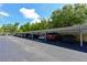 A line of covered parking spaces at 315 30Th W Ave # B311, Bradenton, FL 34205