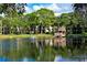 Pond view shows gazebo, fountain, and buildings in the background; trees line the bank at 315 30Th W Ave # B311, Bradenton, FL 34205