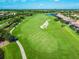 Aerial view of the golf course and residential area at 335 River Enclave Ct, Bradenton, FL 34212