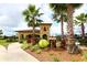 Community tennis center with clubhouse and landscaping at 335 River Enclave Ct, Bradenton, FL 34212
