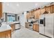 Spacious kitchen featuring ample counter space and stainless steel appliances at 335 River Enclave Ct, Bradenton, FL 34212