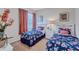 Cozy bedroom with twin beds and cheerful decor at 335 River Enclave Ct, Bradenton, FL 34212