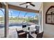 Enjoy this view of the refreshing pool and adjacent patio dining area at 335 River Enclave Ct, Bradenton, FL 34212