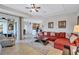 Bright and airy living room, open to kitchen and dining areas at 335 River Enclave Ct, Bradenton, FL 34212