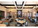 Elegant clubhouse dining room with fireplace and seating at 335 River Enclave Ct, Bradenton, FL 34212