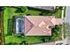 Aerial view of house with pool and screened lania at 335 River Enclave Ct, Bradenton, FL 34212