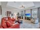 Spacious living room with a comfortable sectional sofa and large TV at 335 River Enclave Ct, Bradenton, FL 34212