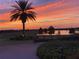 Scenic sunset over golf course and lake at 335 River Enclave Ct, Bradenton, FL 34212