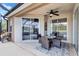 Relaxing patio with table and chairs, offering a view of the pool at 335 River Enclave Ct, Bradenton, FL 34212