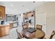 Kitchen dining area with a round table and four chairs at 335 River Enclave Ct, Bradenton, FL 34212