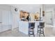 Modern kitchen with stainless steel appliances and an island at 335 River Enclave Ct, Bradenton, FL 34212