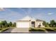 One-story house with a two-car garage and landscaped yard at 4605 Boxelder Avenue, Parrish, FL 34219